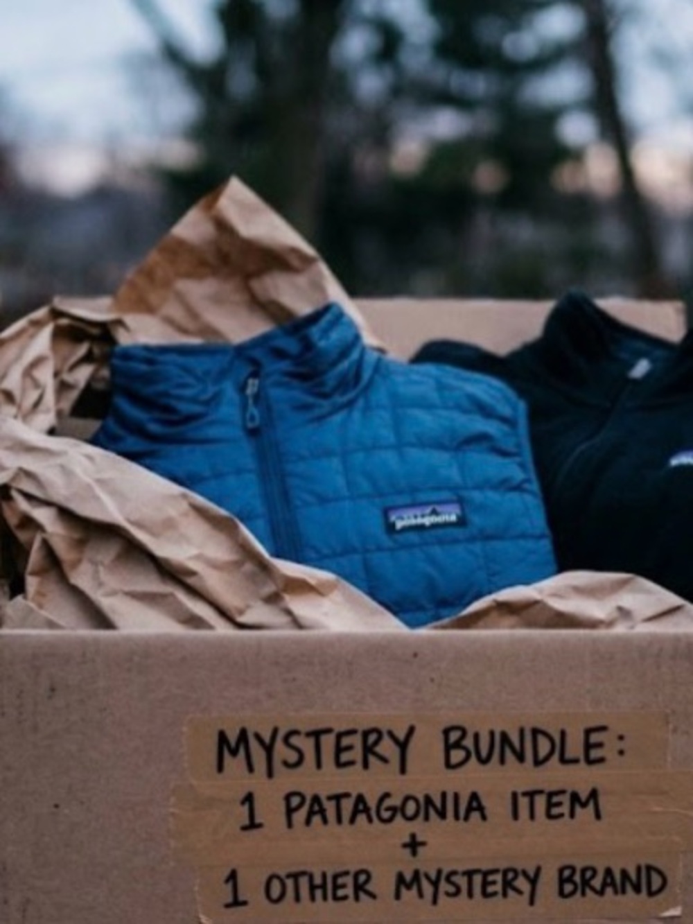 Mystery item box. One Patagonia item and two mystery items.